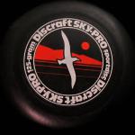 MODEL -  Discraft Sky-Pro sportdisc
COLOR - Black with Red/White hot stamp
WEIGHT - 125gr
CONDITION - Used
COMMENT - Popluar Frisbee Golf disc in the 70s
